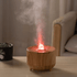 Oracle Crystal Ball Flame Essential Oil Diffuser with red light and aromatic mist.