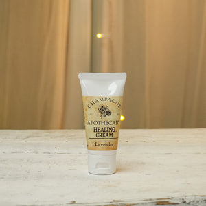 Open image in slideshow, Champagne Apothecary Healing Cream helps to restore and heal dry, cracked &amp; painful skin! You will feel the difference with the first use.  Our Healing Cream will leave your hands and feet softer than they&#39;ve ever felt.  2oz.
