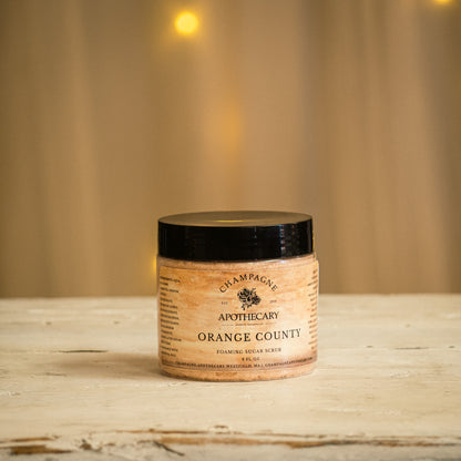 Champagne Apothecary scrubs are creamy, whipped sugar scrubs made to cleanse &amp; exfoliate your skin.  Champagne Apothecary scrubs are made with a mild, paraben-free soap base that is derived from all-natural sources and one preservative to ensure it’s safety as a water-based product.   Champagne Apothecary scrubs are paraben-free, sulfate-free, mild, non-irritating, moisturizing, rich in glycerine, &amp; MPG free.  Orange County!!