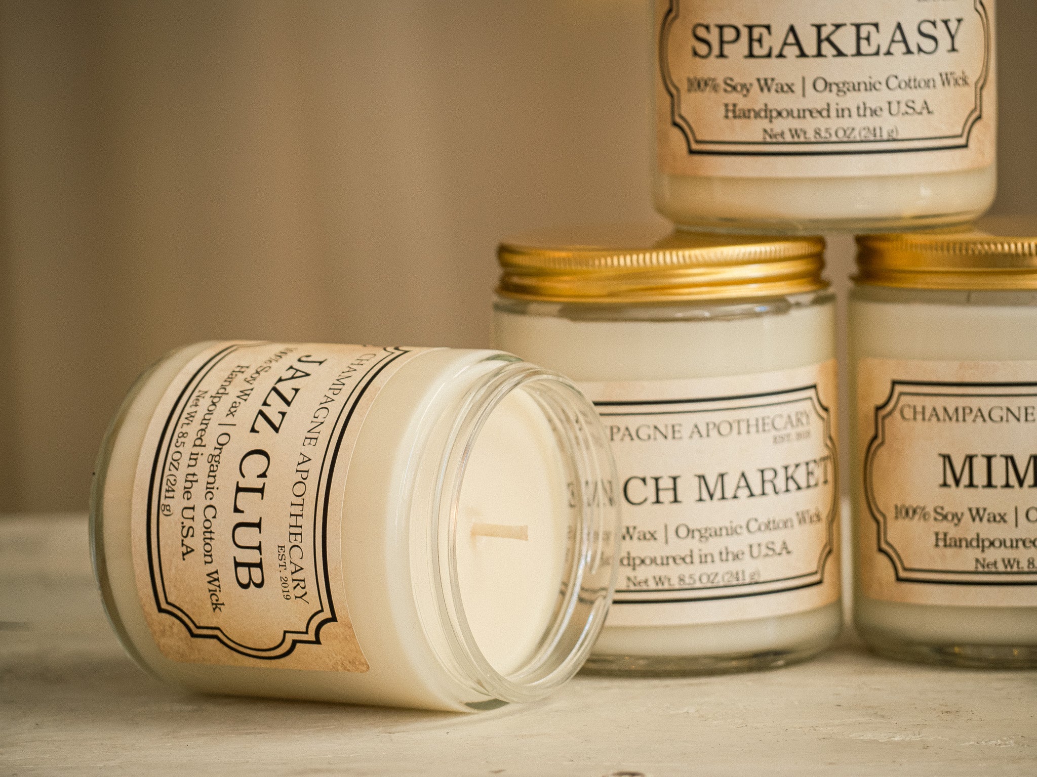 Champagne Apothecary offers 100% Soy Wax Candles These 100% soy candles burn so smoothly! And smell so good! Pair with some of our branded apothecary matches for the perfect gift! Plus for each candle sold, one meal is donated to those in need through Feeding America! Candle Details: Hand poured in the USA 100% soy wax Organic Cotton Wick Natural Fragrance Approximately 40 hour burn time 9 Vintage Scents Available